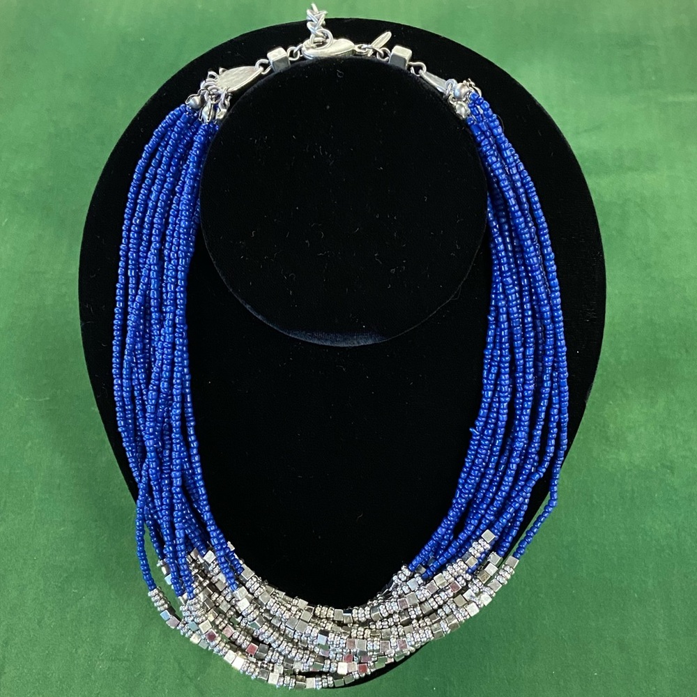 Chico’s multi strand blue bead and silver tone accents.